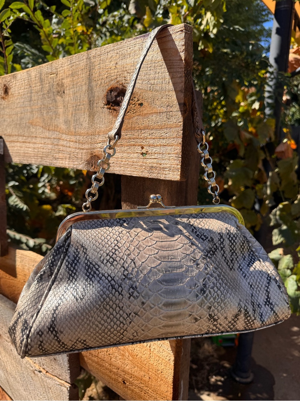Vintage Liz Claiborne python/snakeskin-patterned frame clutch.